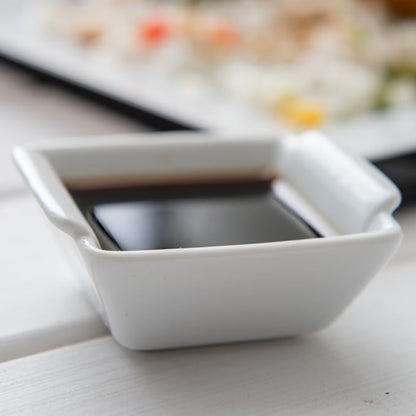 Restaurantware 1 Ounce Soy Sauce Dishes 10 Lipped Dipping Bowls - Built-In Handles Stain-Resistant White Porcelain Mini Bowls Dishwasher-Safe For Appetizers And Condiments
