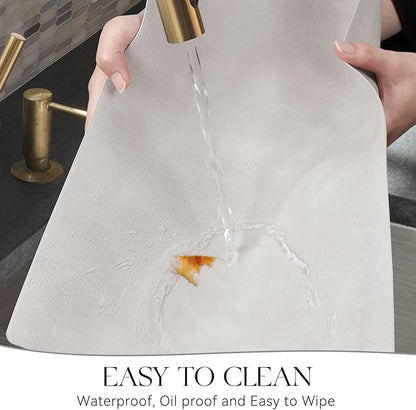 MOSAYT Vinyl Placemats Set of 12-12 X 17 Inch - Faux Leather 100% Waterproof Oil-Proof Wipeable PU Place Mats, Heat Resistant Reversible Table Mats for Kitchen, Dining, Outdoor (Light Grey)