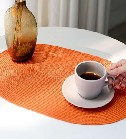 FunWheat Oval Braided Placemats Set of 6 Table Mats for Dining Tables Woven Washable Non-Slip Shining Place mats12x18 Inch Table mats for Indoor Outdoor Use(Oval Orange, 6pcs)