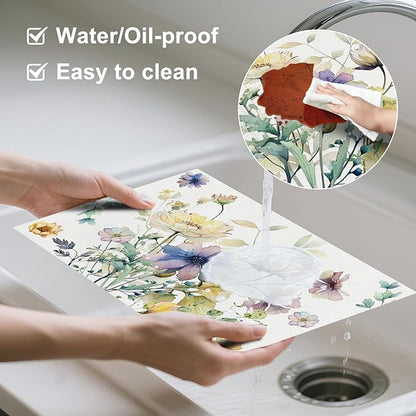 AOFOTO Floral Placemats Set of 4 Watercolor Blue Yellow Flower Green Leaves Printed Place Mats Rectangular Artistic Table Mats for Party Home Kitchen Restaurant Dining Table Decor 12x18 Inch